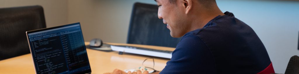 Student working on a laptop